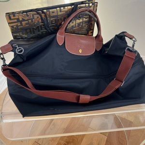 Black Long Champ expandable travel bag